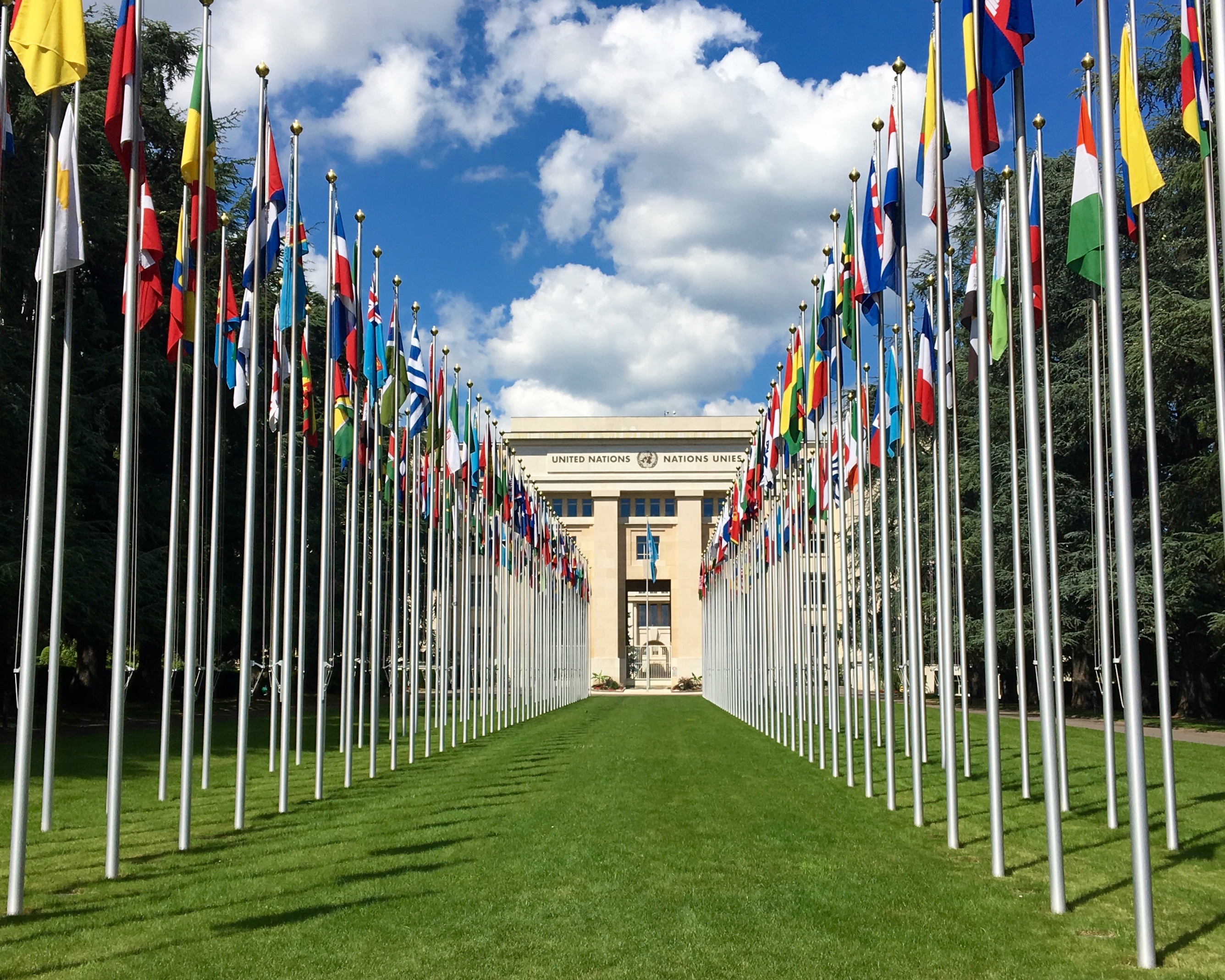 UN headquarters in Geneva behind two rows of flags