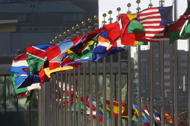 World flags in front of UN headquarters