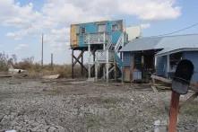 House on Isle de Jean Charles damaged by flooding