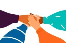 Four hands on top of each other