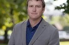 Headshot of Louis P. Nelson