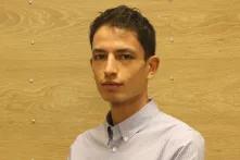 headshot of Sami Ramdani