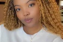 headshot of Ann Kazhinga Holland