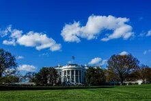 the White house on a partly cloudy day