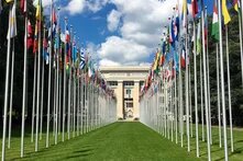 UN headquarters in Geneva behind two rows of flags
