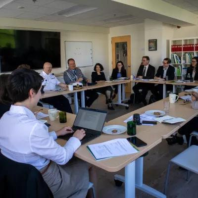 The participants of the Study Tour are sitting in the conference room in the DC Boell office and are attending the introductory briefing of the tour.