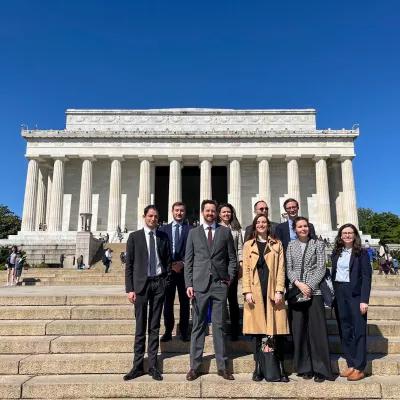 A group photo of the participants of the Study Tour in front of the Lincoln Memorial.