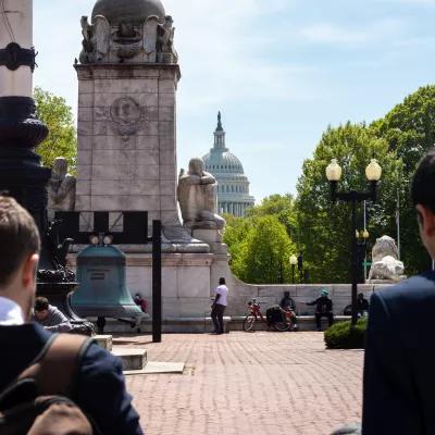 The participants of the Study Tour are walking to the Capitol