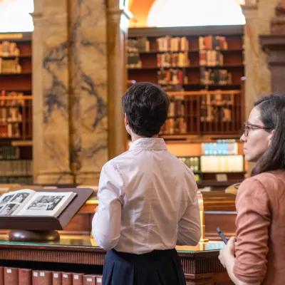 The participants are walking through the Library of Congress