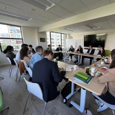 The participants are attending the last meeting of the Study Tour in the conference room of the Boell office.