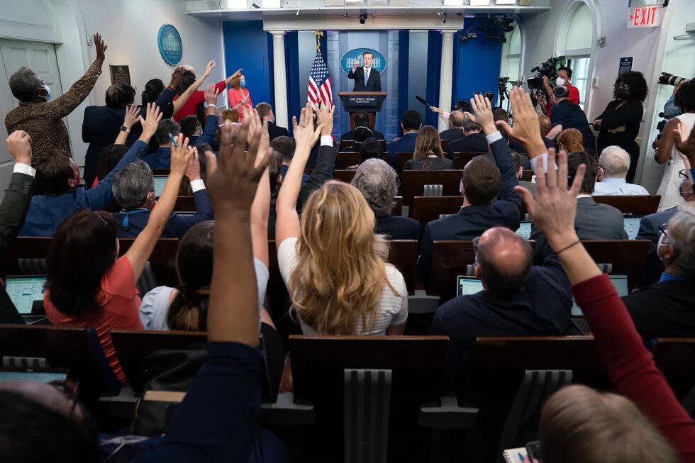 reporters at the White House asking questions
