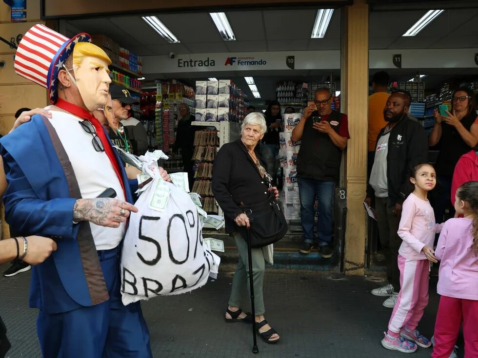 protest featuring a caricature of Trump